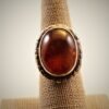 Sterling Silver Ring with Engraved Design and Amber Stone.