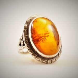 Sterling Silver Ring with Engraved Design and Amber Stone.