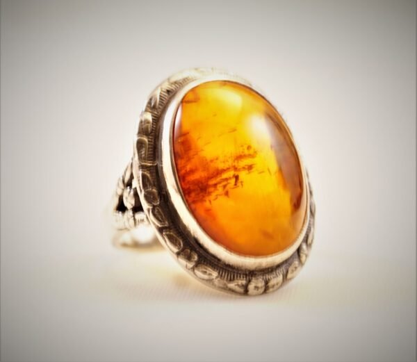 Sterling Silver Ring with Engraved Design and Amber Stone.