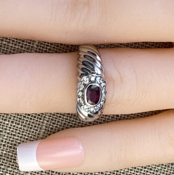 Ruby Platinum Ring with Diamond Halo – A Symphony in Elegance, Oval.60 ct.