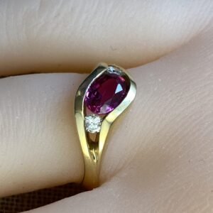 Classic Majesty: Three-Stone Ruby and Diamond Ring in Yellow Gold, Ring size 6.5