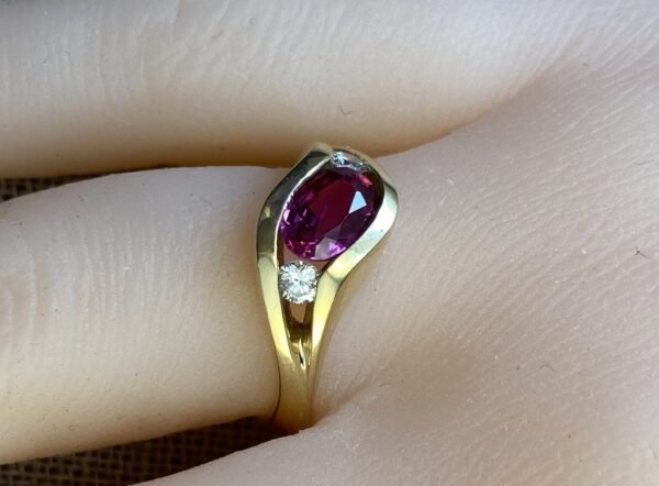Classic Majesty: Three-Stone Ruby and Diamond Ring in Yellow Gold, Ring size 6.5