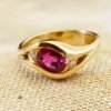 Classic Majesty: Three-Stone Ruby and Diamond Ring in Yellow Gold, Ring size 6.5