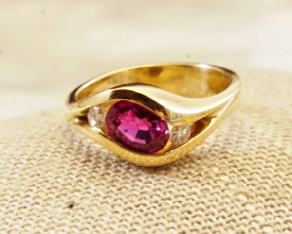 Classic Majesty: Three-Stone Ruby and Diamond Ring in Yellow Gold, Ring size 6.5