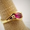 Classic Majesty: Three-Stone Ruby and Diamond Ring in Yellow Gold, Ring size 6.5