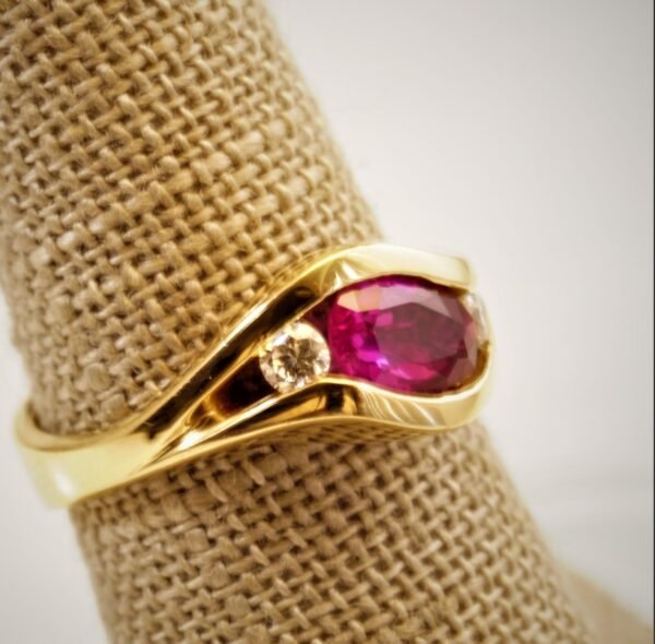 Classic Majesty: Three-Stone Ruby and Diamond Ring in Yellow Gold, Ring size 6.5