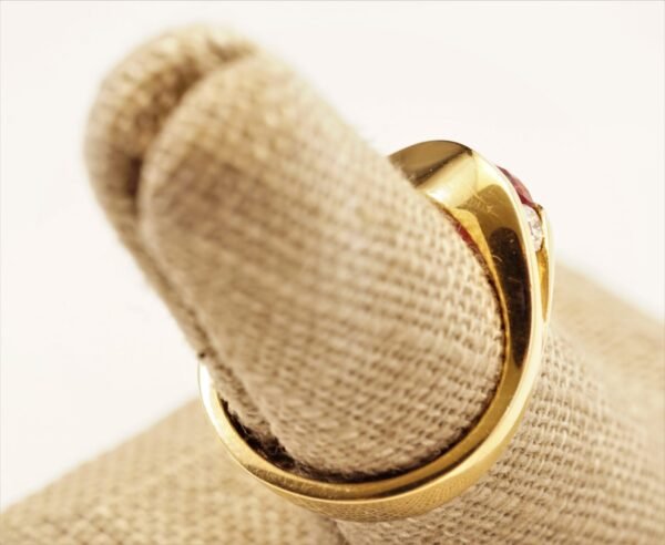 Classic Majesty: Three-Stone Ruby and Diamond Ring in Yellow Gold, Ring size 6.5