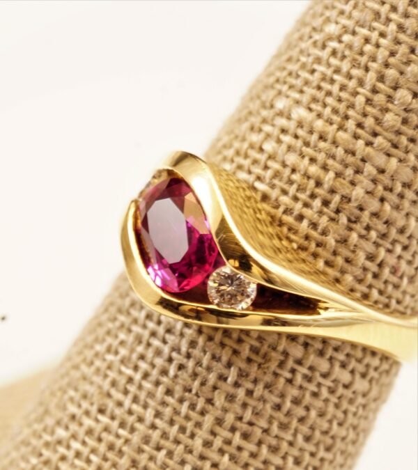Classic Majesty: Three-Stone Ruby and Diamond Ring in Yellow Gold, Ring size 6.5