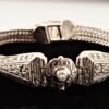 Silver interweaved bracelet with CZ.