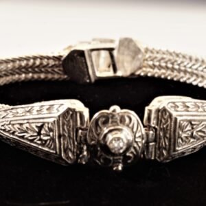 Silver interweaved bracelet with CZ.