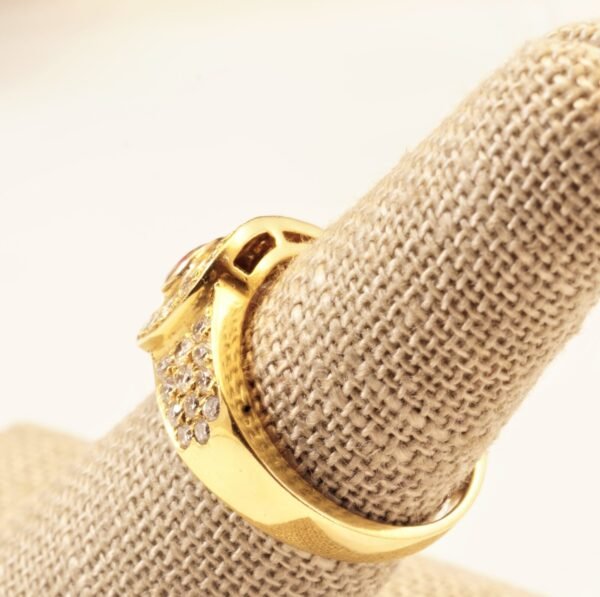 teardrop ruby buckle.d Pear-Shaped Deep-Red Ruby Ring with Pave Diamond Accents in 14K Yellow Gold