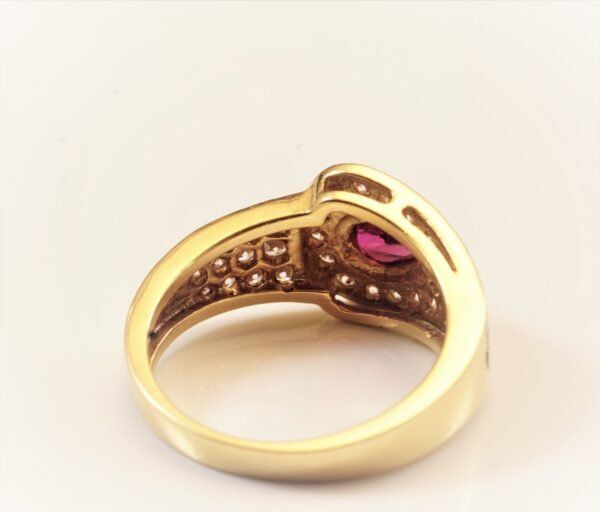 teardrop ruby buckle.i Pear-Shaped Deep-Red Ruby Ring with Pave Diamond Accents in 14K Yellow Gold