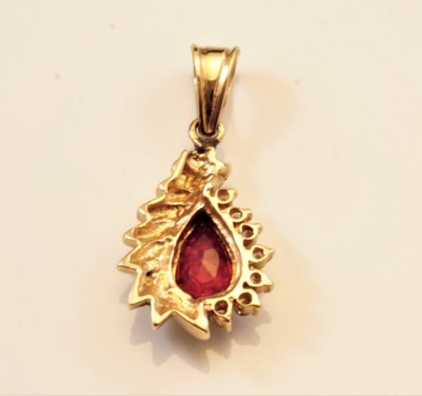 teardrop ruby pendant.h Pear-Shaped Ruby Pendant with Feather Design in 4K Yellow Gold with Diamond